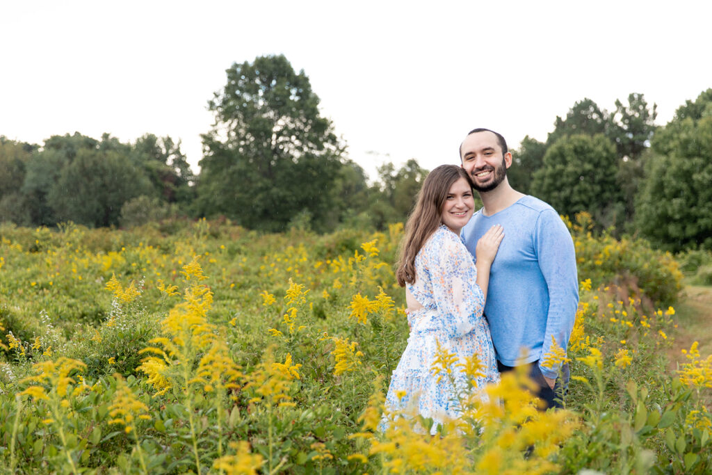 Romantic engagement photos near DC at Terrapin Nature Park with bay views and natural greenery