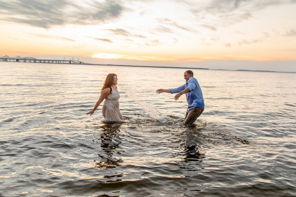 Hope and Tyler laughing and running through the shallow water at Terrapin Nature Park.