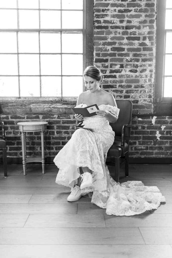 Emotional first look with private letters at Woolen Mill wedding