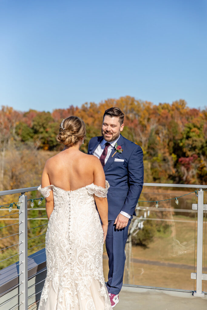 Rooftop first look at The Woolen Mill Fredericksburg wedding