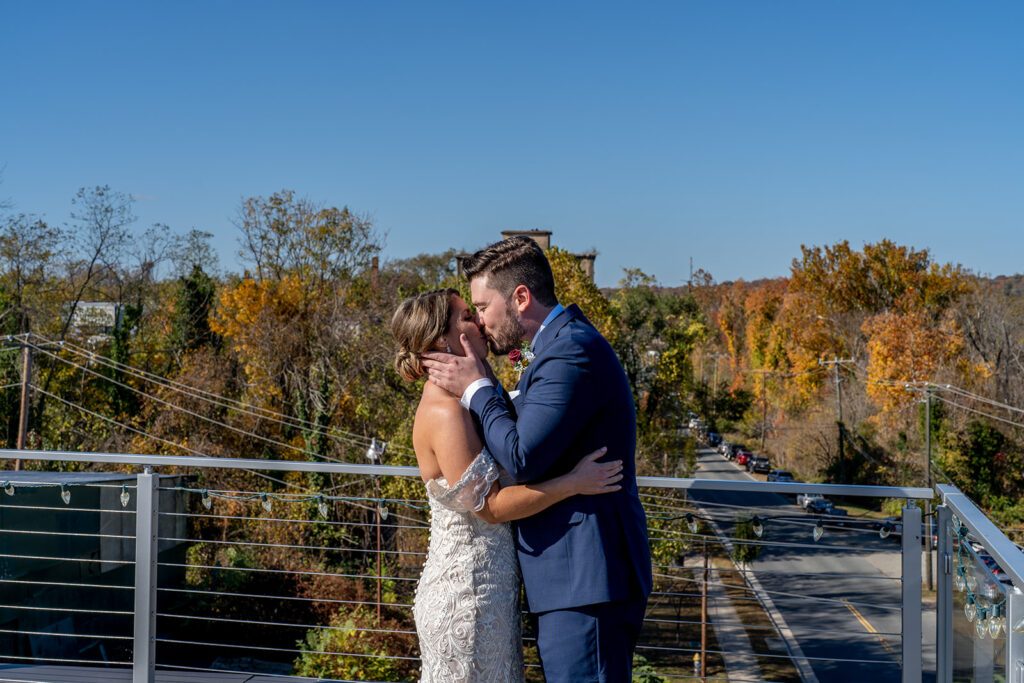 Rooftop first look at The Woolen Mill Fredericksburg wedding