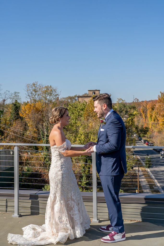 Rooftop first look at The Woolen Mill Fredericksburg wedding