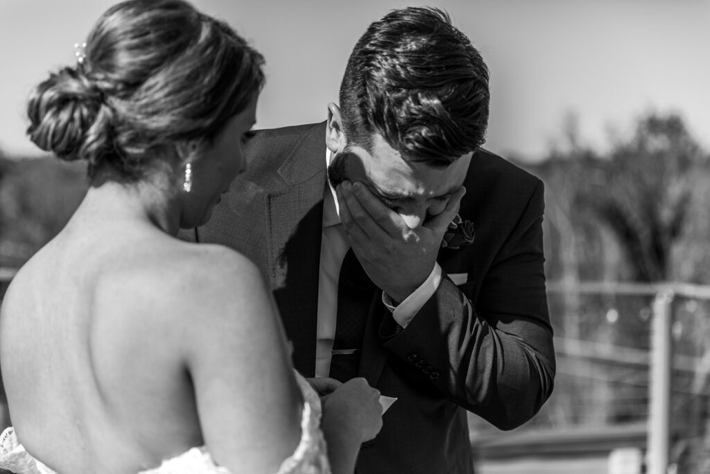 Rooftop first look at The Woolen Mill Fredericksburg wedding