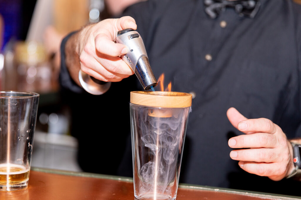 Wedding reception with exposed brick at The Woolen Mill