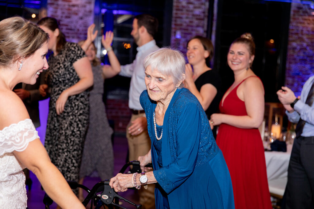 Wedding reception with exposed brick at The Woolen Mill