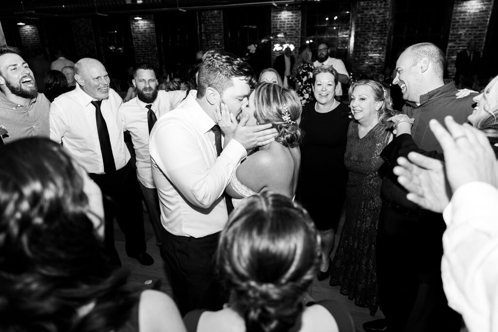 Wedding reception with exposed brick at The Woolen Mill