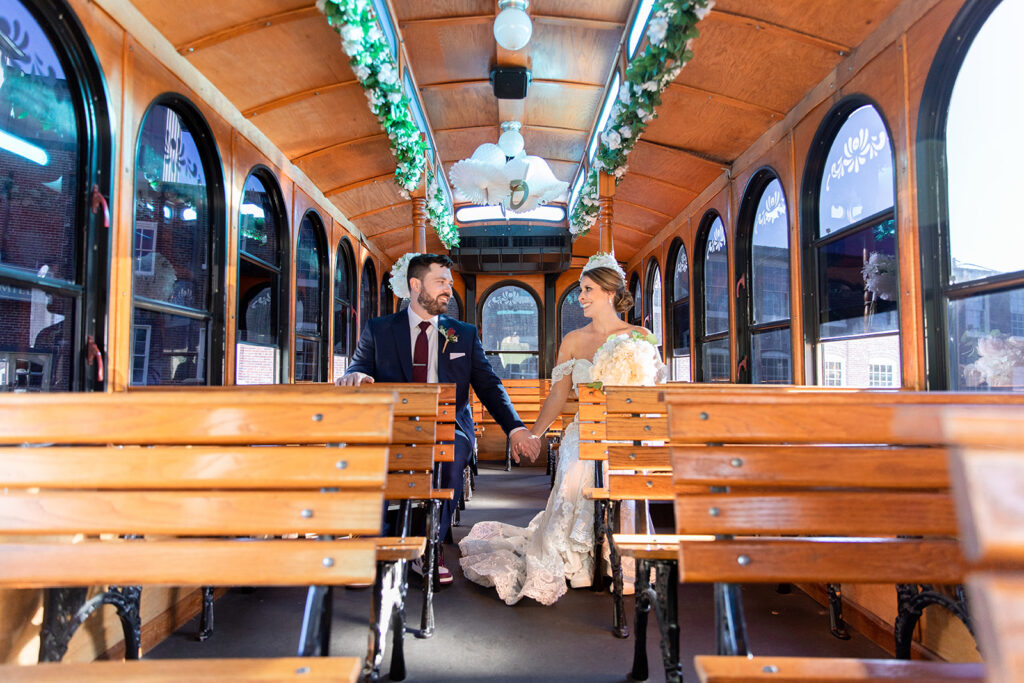 Bride and groom photos on the Fredericksburg Trolley at the Woolen Mill