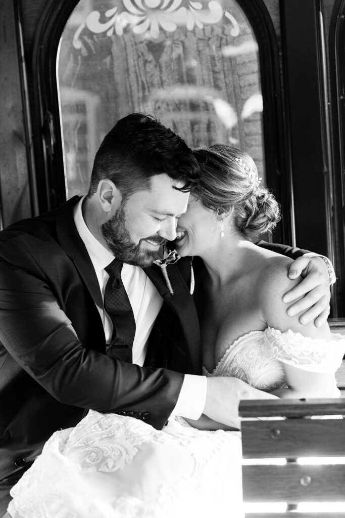 Bride and groom photos on the Fredericksburg Trolley at the Woolen Mill