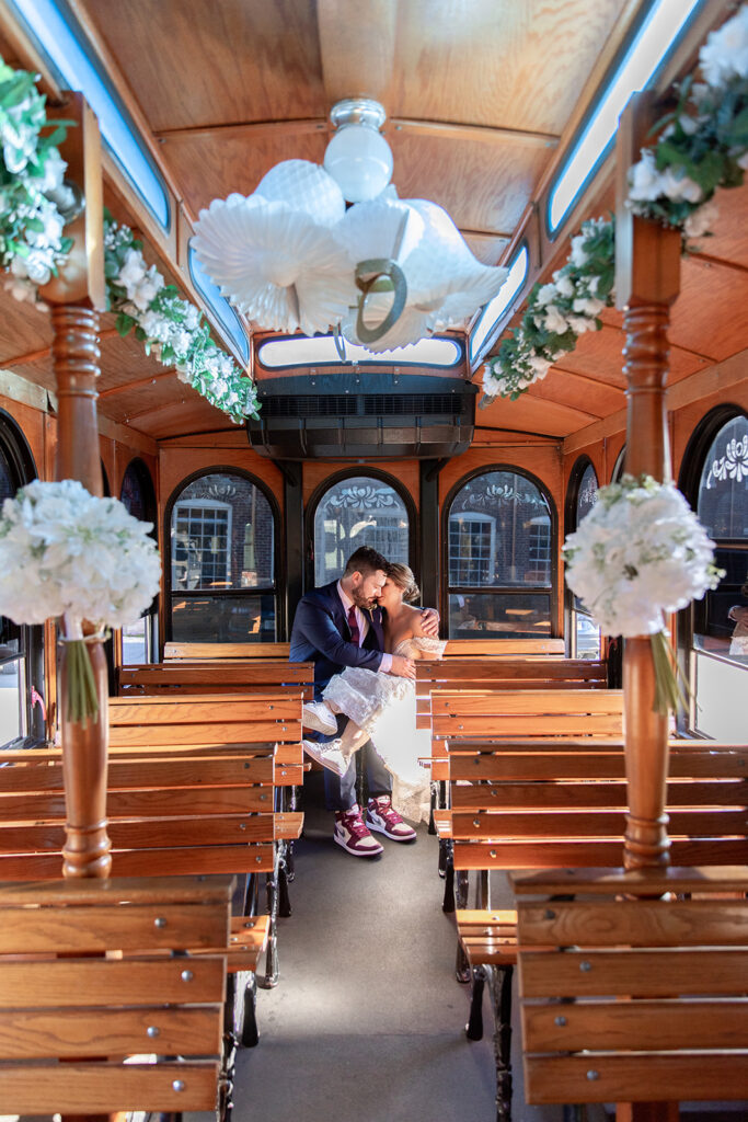 Bride and groom photos on the Fredericksburg Trolley at the Woolen Mill
