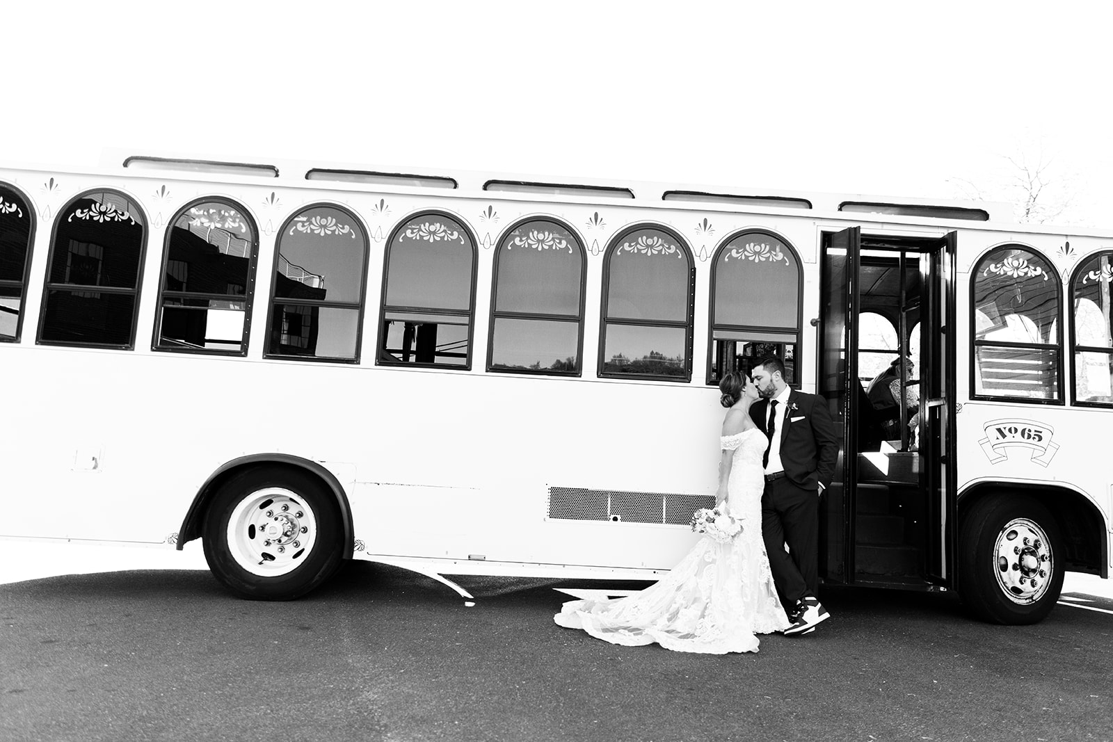 Bride and groom photos on the Fredericksburg Trolley at the Woolen Mill